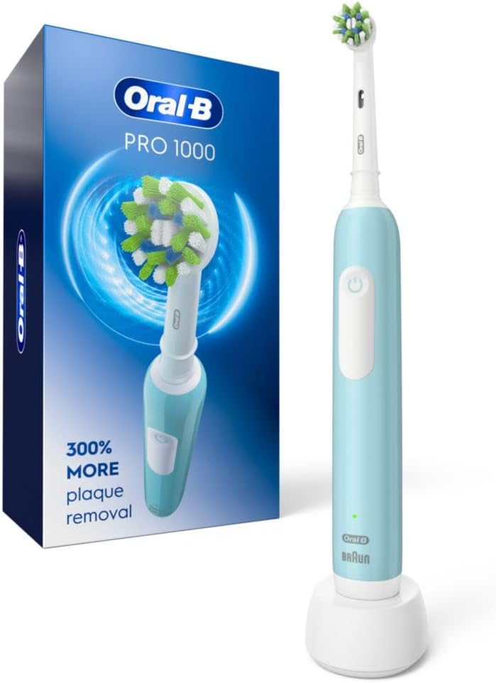 Oral-B Pro 1000 CrossAction Electric Toothbrush, Pink, Powered by Braun