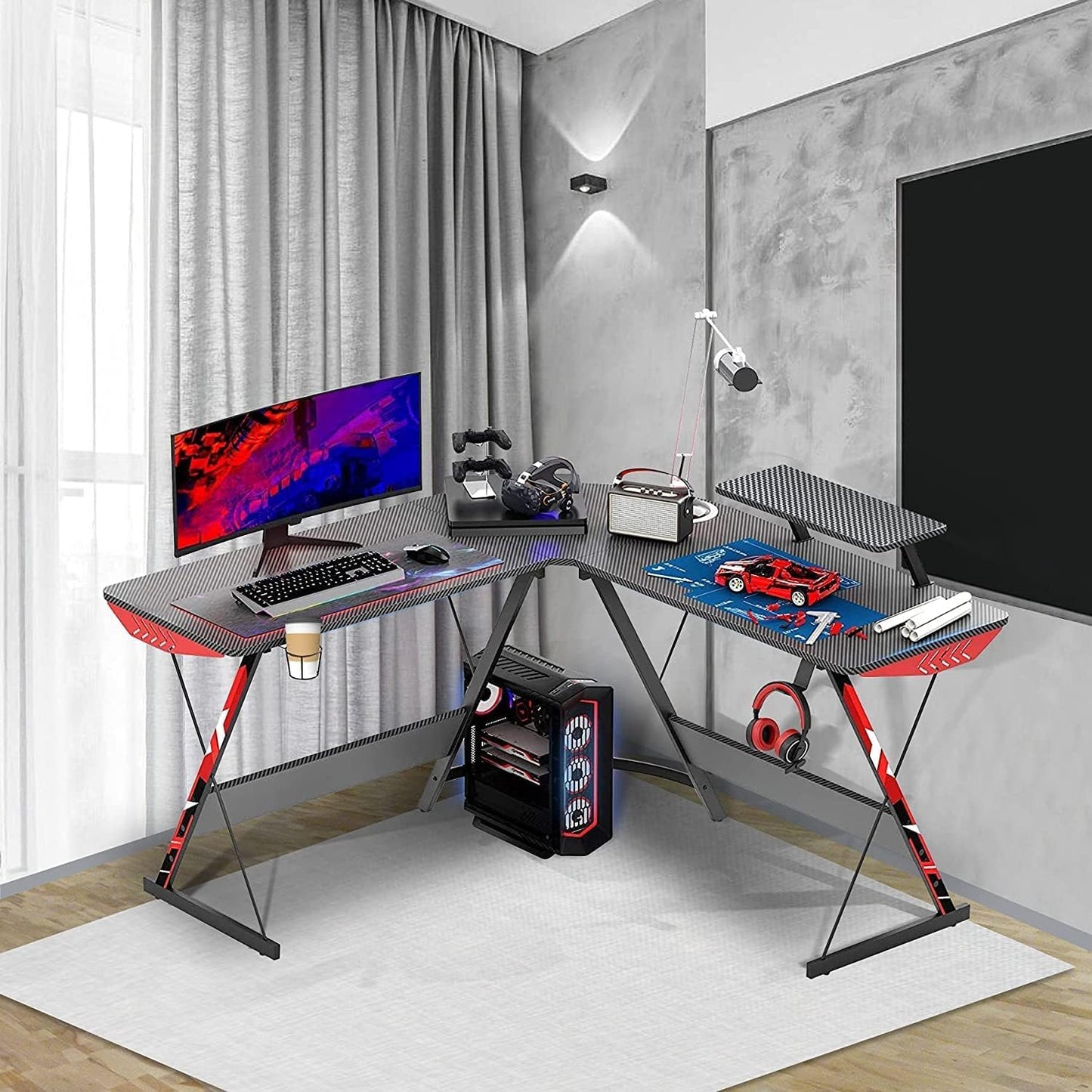 L Shaped Gaming Desk 130cm L Shaped Desk, Carbon Fiber Coated, Computer Corner Desk with Large Monitor Riser Stand for Home Office, Sturdy Writing Workstation, Gaming Desk with Shelf, Black