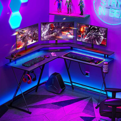 Chulovs Gaming Desk 50.4” with LED Strip & Power Outlets, L-Shaped Computer Corner Desk Carbon Fiber Surface with Monitor Stand, Ergonomic Gamer Table with Cup Holder, Headphone Hook (Black)