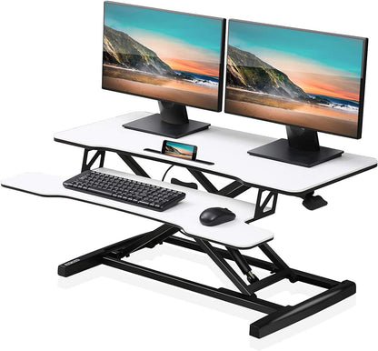 FITUEYES Height Adjustable Standing Desk 36â€ Wide Sit to Stand Converter Stand Up Desk Tabletop Workstation for Laptops Dual Monitor Riser Black SD309101WB